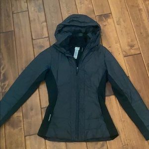 Hooded women’s light puffer coat